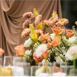 Magical Moments Design & Event Planning - Luxury floral styling with warm tones and refined textures.