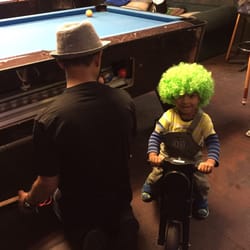 Mulligans Public House - Cool pool table and this kid seemed right at home!