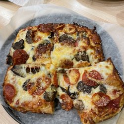 Elroy's Deli Market - Detroit's deep dish. Choose Your Pizza Toppings, I got extra cheese, pepperoni, mushrooms.