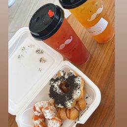 two donuts and a drink