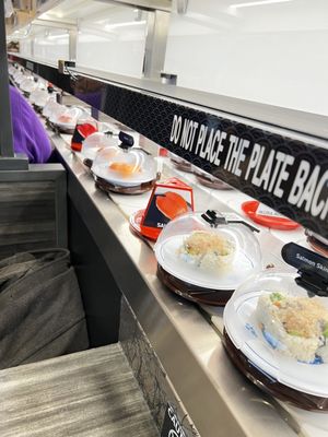 Kura Revolving Sushi Bar by null