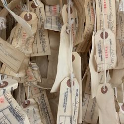 Fresno Art Museum - Tags from THE TAG PROJECT-- These tags were worn by Japanese Americans on the way to Internment Camps