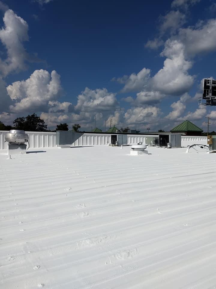 Slide of K & C Seamless Roofing