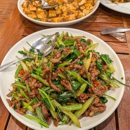 Mapo tofu with pork top, cilantro beef bottom Mapo tofu with pork top, cilantro beef bottom