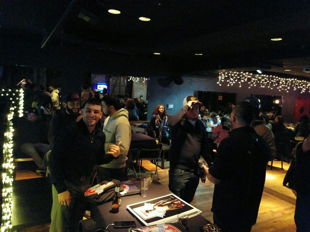 On the left is the Titan FC 125lbs champ Jose "Shorty" Torres