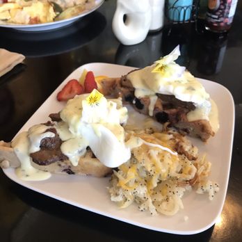 Faye's Cafe - Coconut eggs benedict over berry waffles - Cafes Near Me - Livingston, Montana