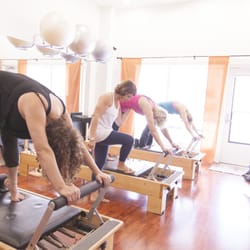 Westwood Pilates - Daniela teaching a reformer class.