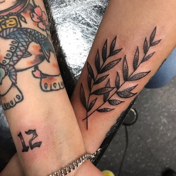 Timeless Ink Studio - Mikel Vu did the laurel branches and the number 12 - Piercing Near Me - Houston, Texas Timeless Ink Studio - Mikel Vu did the laurel branches and the number 12 - Piercing Near Me - Houston, Texas
