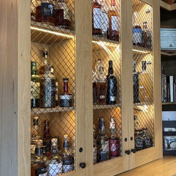 Hops & Scotch - Japanese whisky cabinet: Locked cabinets holding the Japanese whisky and rare pours - Whiskey Bars Near Me - Walnut Creek, California