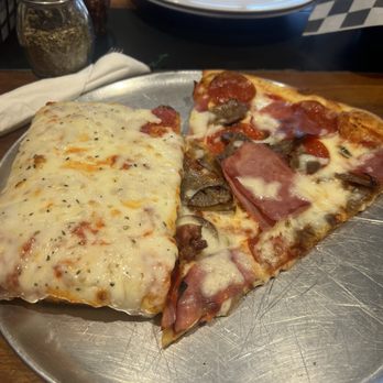 Little Sicily - Sicilian cheese slice on the left and meat lovers on the right - Italian Near Me - Fort Myers, Florida