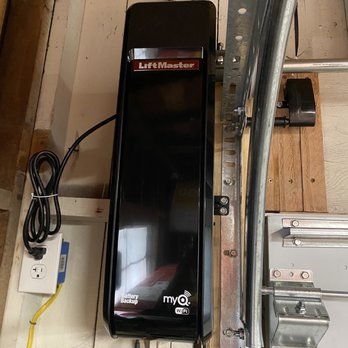Central Valley Overhead Door - New unit all to one side and not hanging from the ceiling in the middle of the garage. Slick 8500 W unit! Will send email alert when opened. - Garage Door Services Near Me - Fresno, California