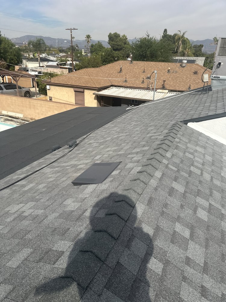 Slide of T’S Roofing