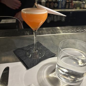 Monarque - Paper plane (the drink) with an actual paper plane clipped to the side - Brasseries Near Me - Montreal, Quebec