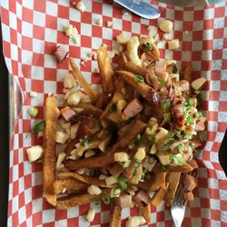 Dida’s - Double Double poutine - gravy, cheese curds (only way to make true poutine) bacon & Canadian Bacon,  sprinkle of shallots Oh yeah delish!!!