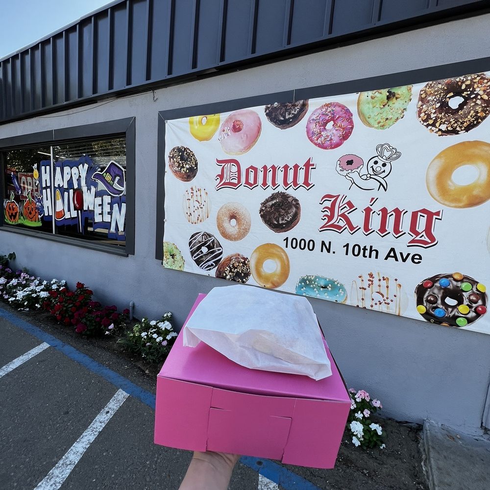 Donut King - a person holding a box of donuts - Donuts Near Me - Hanford, California Donut King - a person holding a box of donuts - Donuts Near Me - Hanford, California