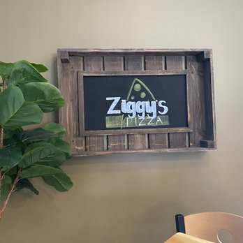 Ziggy's Pizza - a sign on the wall - Sandwiches Near Me - Enfield, New Hampshire