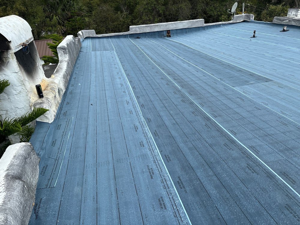 Slide of Pinnacle Roofing Group