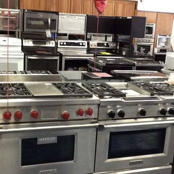 Bray & Scarff - Kitchen showroom with stainless steel wolf ranges in display and more ranges in the back - Appliances Near Me - Alexandria, Virginia Bray & Scarff - Kitchen showroom with stainless steel wolf ranges in display and more ranges in the back - Appliances Near Me - Alexandria, Virginia
