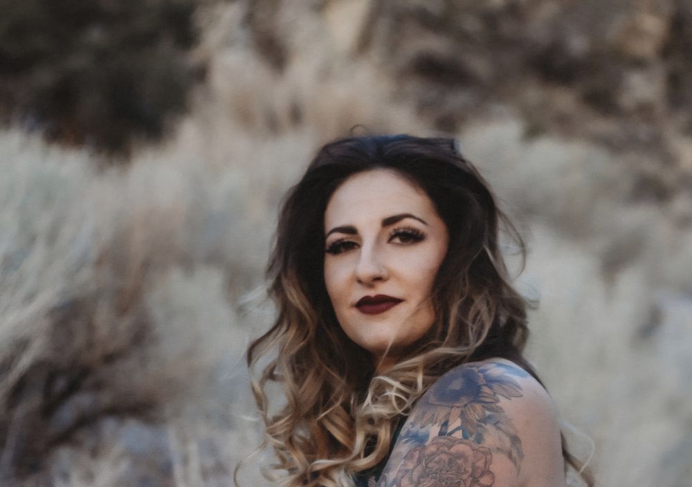 Massage and Cosmetology by Michaelia Logo
