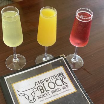The Butcher Block Kitchen - Pineapple, orange & cranberry mimosas - Breakfast & Brunch Near Me - Groveland, Florida The Butcher Block Kitchen - Pineapple, orange & cranberry mimosas - Breakfast & Brunch Near Me - Groveland, Florida