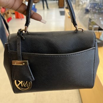Goodwill Thrift Store & Donation Center - River Oaks - The back of the Michael Kors handbag - Thrift Stores Near Me - Houston, Texas