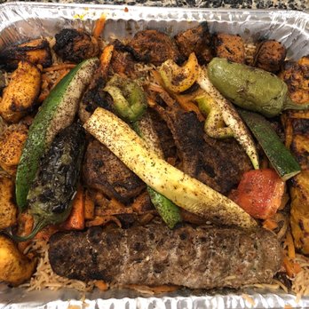 Pukhtun Afghan Cuisine - Lamb Pukhtun Chicken and Lamb Mixed Platter - Afghan Near Me - New Brunswick, New Jersey Pukhtun Afghan Cuisine - Lamb Pukhtun Chicken and Lamb Mixed Platter - Afghan Near Me - New Brunswick, New Jersey