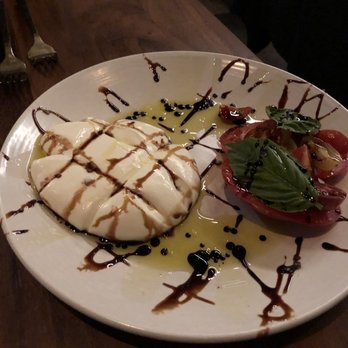 Giulia - Mozzarella caprese! So fun to watch the mozzarella made at our table. Highly recommend. - American Near Me - Minneapolis, Minnesota Giulia - Mozzarella caprese! So fun to watch the mozzarella made at our table. Highly recommend. - American Near Me - Minneapolis, Minnesota