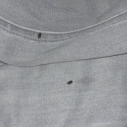 Mouse droppings on my jeans I left out on the desk