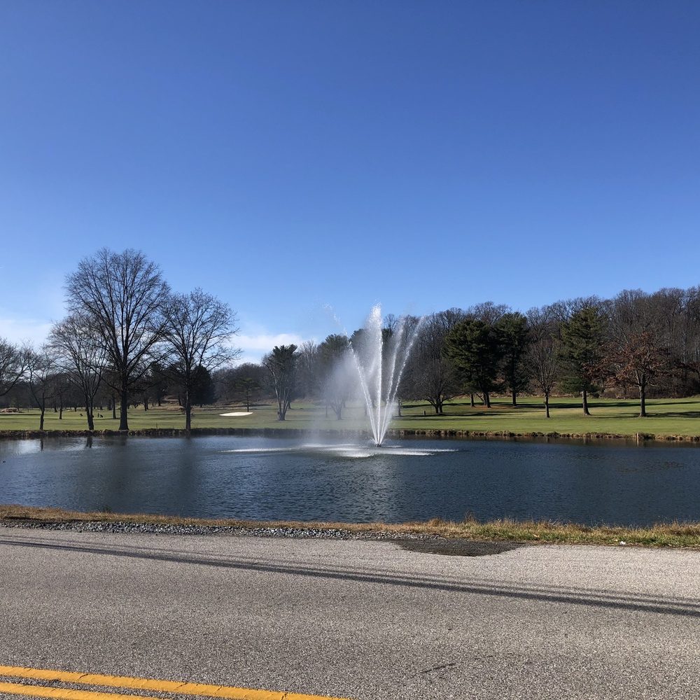 Alexandra's Restaurant - a fountain in the middle of a pond - New American Near Me - Ellicott City, Maryland