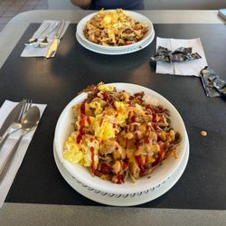 Waffle House - chicken melt has brown bowl double diced smothered and peppered with a scrambled egg and the same thing only single diced