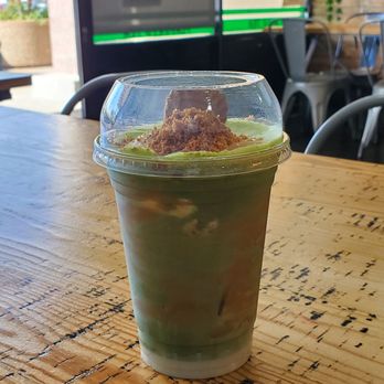 Tea Culture - Biscoff Banana Pudding Matcha Latte ($8.25) - Desserts Near Me - Elk Grove, California Tea Culture - Biscoff Banana Pudding Matcha Latte ($8.25) - Desserts Near Me - Elk Grove, California