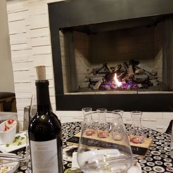Michael Angelo's Winery - Sitting by the fire after a flight and then a bottle - Wineries Near Me - Richfield, Ohio Michael Angelo's Winery - Sitting by the fire after a flight and then a bottle - Wineries Near Me - Richfield, Ohio