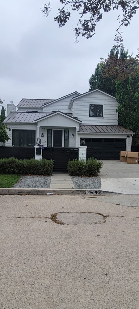 Slide of Tinoco Roofing