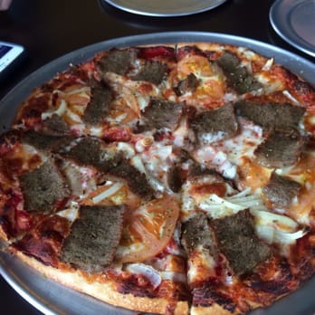 Santorini Cafe - Thin crust lamb pizza. New favorite!!! - Greek Near Me - Austin, Texas