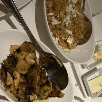 Eddie V's Prime Seafood - Crab Fried Rice and Honey Sriracha Roasted Brussels Sprouts with Cashews - Seafood Near Me - Plano, Texas Eddie V's Prime Seafood - Crab Fried Rice and Honey Sriracha Roasted Brussels Sprouts with Cashews - Seafood Near Me - Plano, Texas