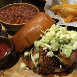 Q39 South - Triple threat sandwich (sausage, pulled pork, pork belly, and slaw) plus sides of fries and beans