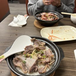a man taking a picture of his meal