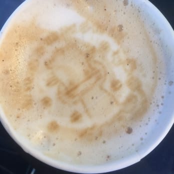 Local Joe - Imprinted foam art by the owner.  It's a cow - Coffee & Tea Near Me - Honolulu, Hawaii