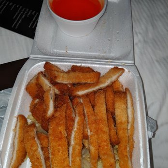 China A Go Go - Lemon chicken, soooo much chicken (which isn't too bad) and weird sauce. - Chinese Near Me - Pahrump, Nevada China A Go Go - Lemon chicken, soooo much chicken (which isn't too bad) and weird sauce. - Chinese Near Me - Pahrump, Nevada