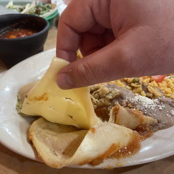Pepes Mexican Restaurant and Store - The slice cheese in my cheese enchilada. - Mexican Near Me - Ocala, Florida