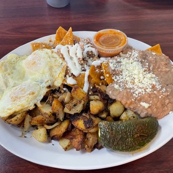 Rodeo Cafe - Red Chilaquiles, Easy Over Egg with House Potato's. - Cafes Near Me - Rancho Cucamonga, California