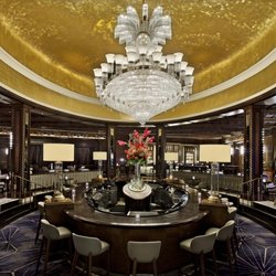 Chandelier Bar - Savor Sushi and signature cocktails, served beneath the radiant aura of our famous Czechoslovakian crystal centerpiece.
