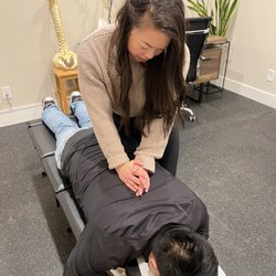Movement Lab Chiropractic - Dr. Kimi Adjusting Thoracic Spine