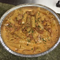 Crazy Cow Steak and Pizza - We also have  dinners! This is Vodka rigatoni ! Served with a small dinner salad dressing of choice and bread and butter!