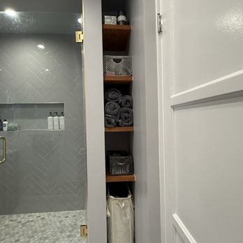 Lynx construction - The custom "storage nook" we asked for with beautiful natural wood shelves. - General Contractors Near Me