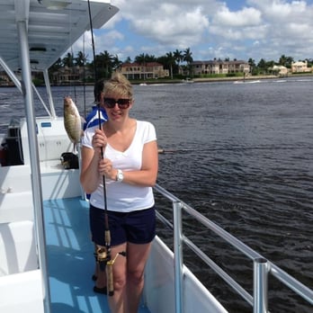 Pure Florida - Diane's caught her first ever fish today a 12inch mangrove snapper - Boat Charters Near Me - Naples, Florida