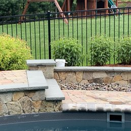 a child playing in a pool
