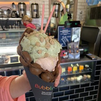 Bubbleology - a person holding a cone of ice cream - Bubble Tea Near Me - Clinton Township, Michigan Bubbleology - a person holding a cone of ice cream - Bubble Tea Near Me - Clinton Township, Michigan