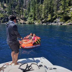 Boat Tahoe - Our captain, Brandon, is getting the kids set up for their first ride around the lake.