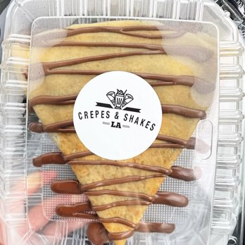 Crepes and Shakes LA - a hand holding a pastry - Ice Cream & Frozen Yogurt Near Me - Glendora, California Crepes and Shakes LA - a hand holding a pastry - Ice Cream & Frozen Yogurt Near Me - Glendora, California